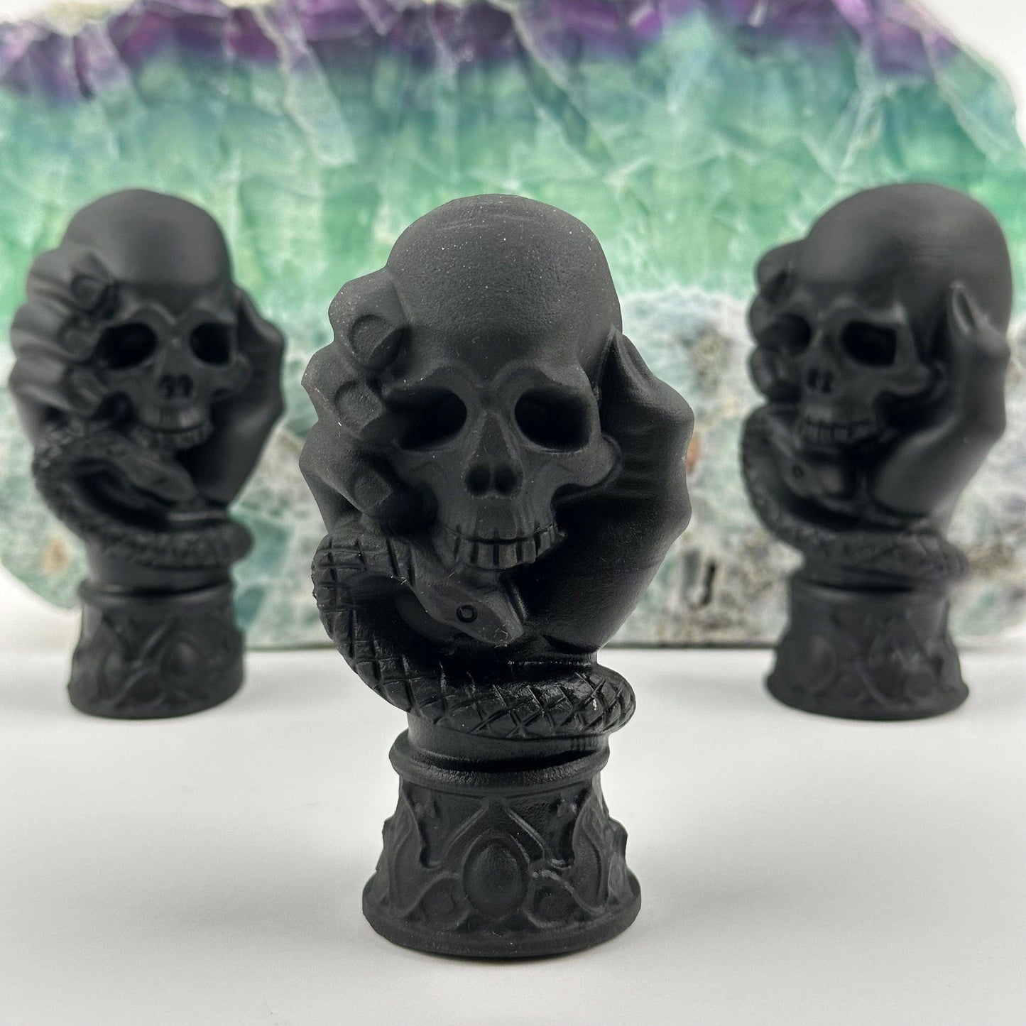 Black Obsidian Crystal Skull on Hand