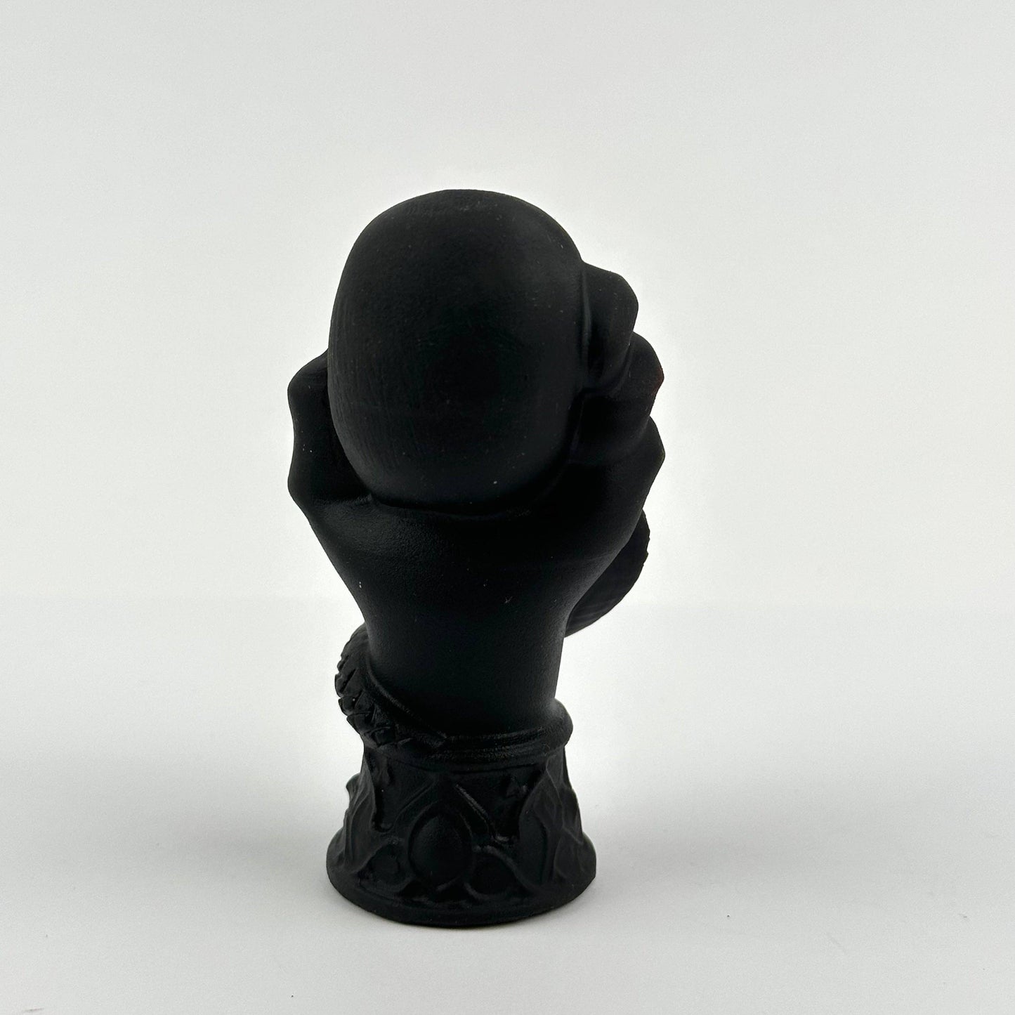 Black Obsidian Crystal Skull on Hand