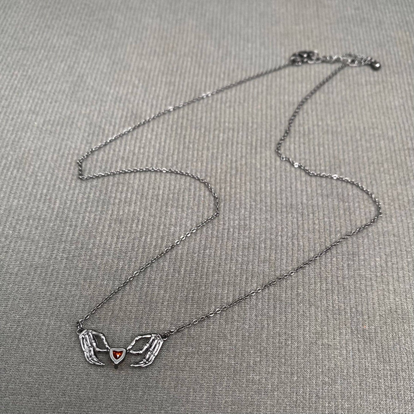Gothic Style Heart In Skull Hand Black Necklace - GT