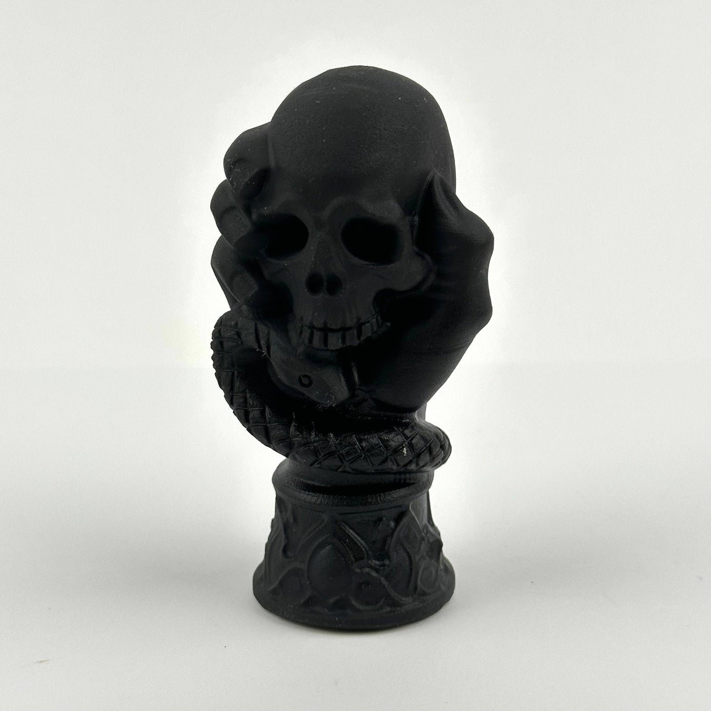 Black Obsidian Crystal Skull on Hand