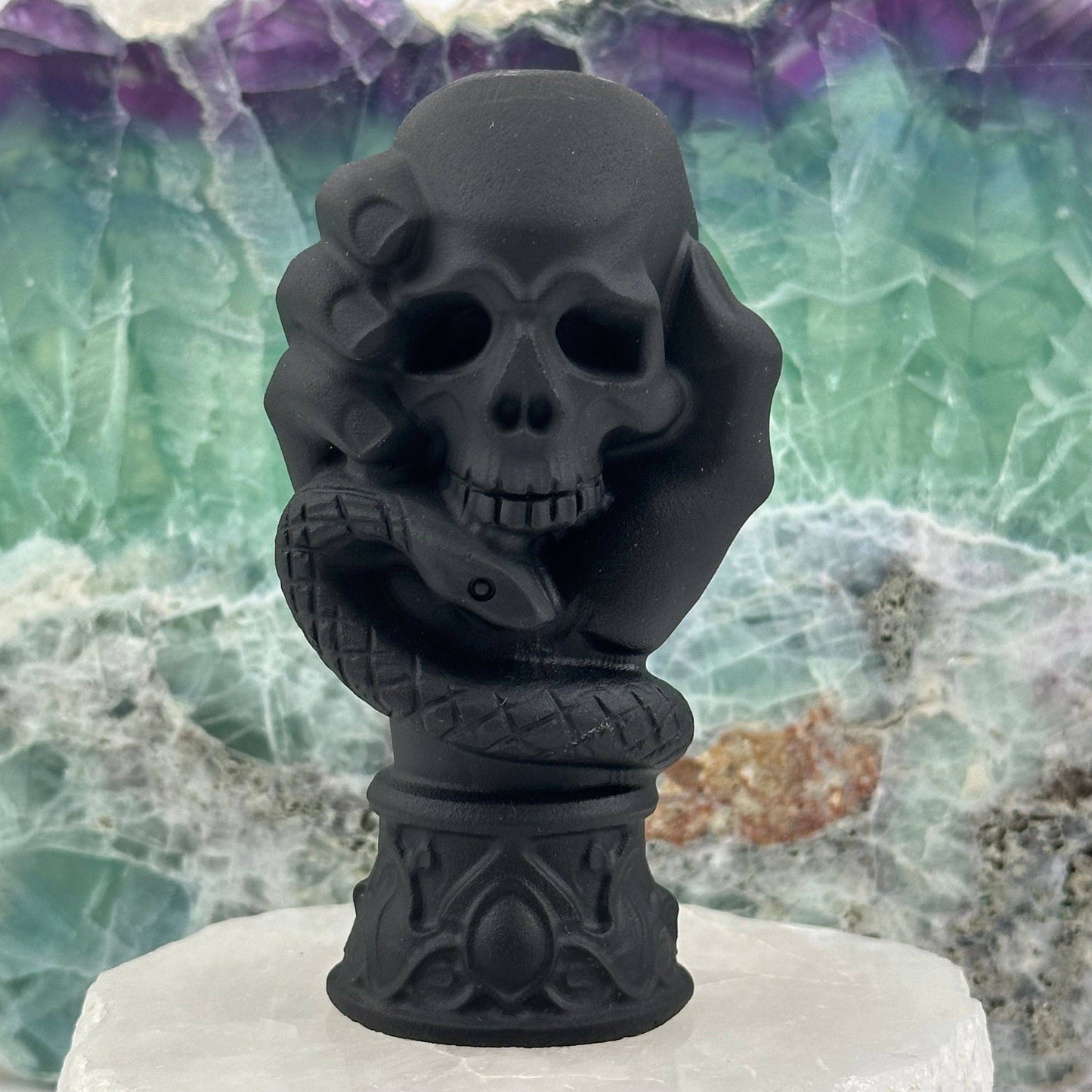 Black Obsidian Crystal Skull on Hand